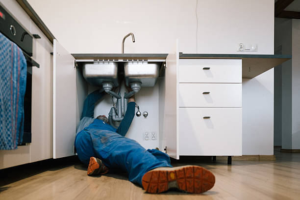 Professional Plumbing technician working in Ballwin, MO
